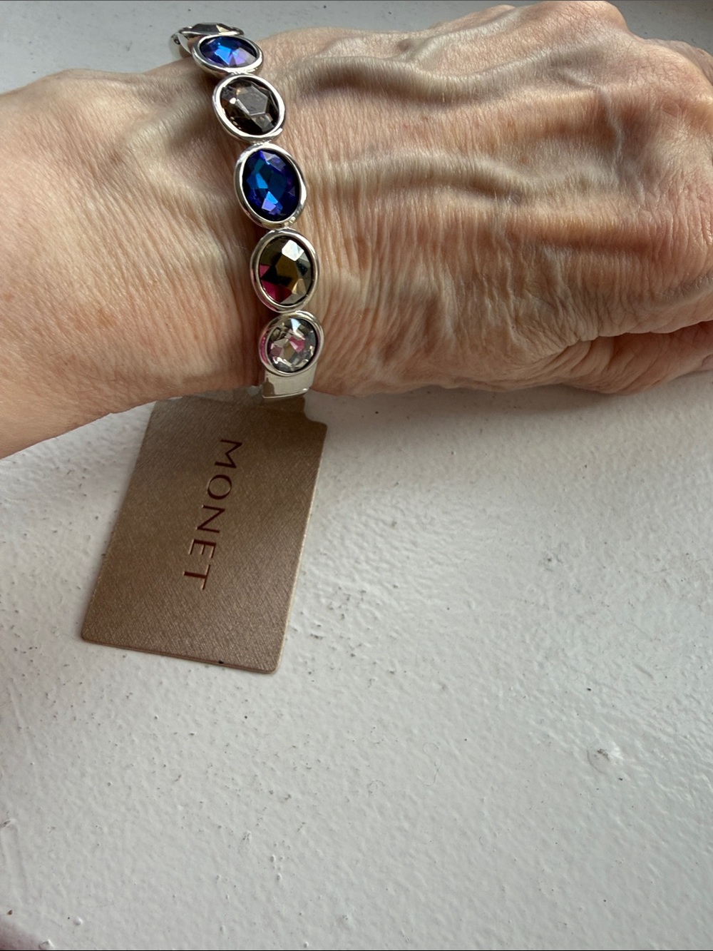 NWT Monet Fire & Ice Silver Tone Hinge Stretch Bracelet w/Bezel Set Stones.